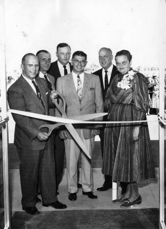 Ribbon cutting ceremony with hospital administrator and board members