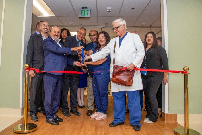 Antelope Valley Medical Center CEO, Edward Mirzabegian cuts ribbon,  surrounded by the City of Palmdale Mayor Austin Bishop and Antelope Valley  Healthcare District Board Members